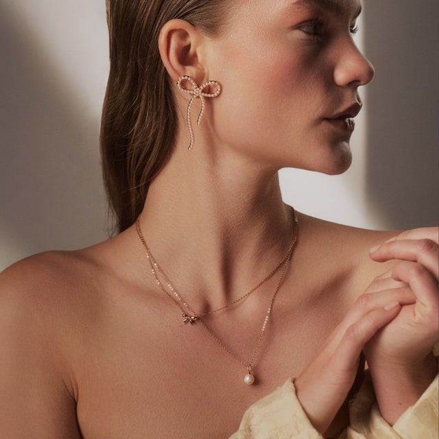 Tipperary Crystal Pendant - Bow Collection - Bow & Pearl Double Necklace Gold