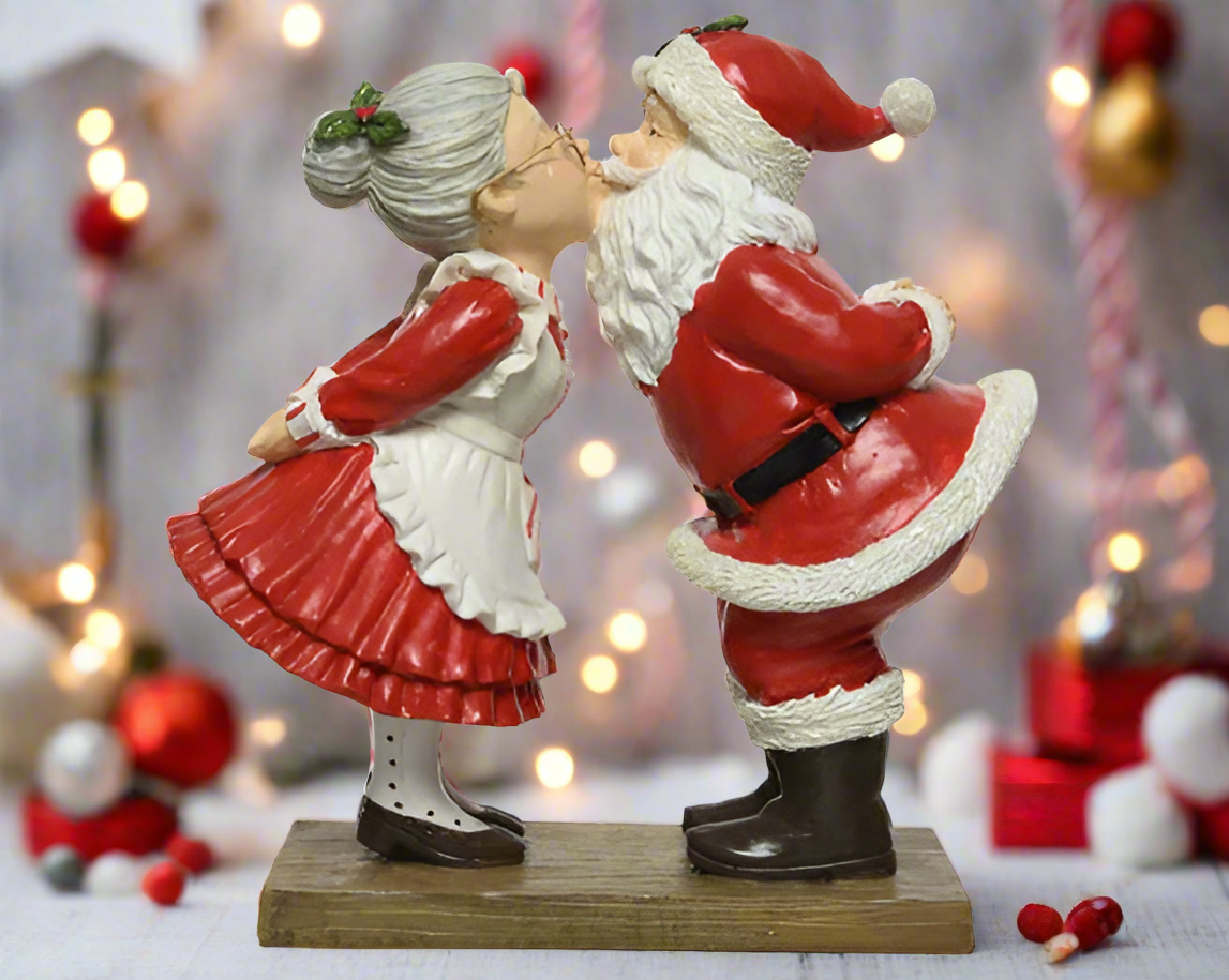 Santa & Mrs Claus Kissing Polyresin Figure